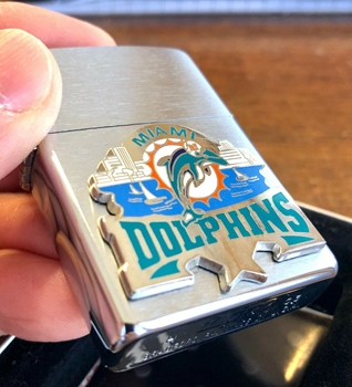 Race World: Football: Accessories: Miami Dolphins Helmet Zippo Lighter::  NFL Zippo Lighter with Sculpted and Enameled Miami Dolphins Helmet.